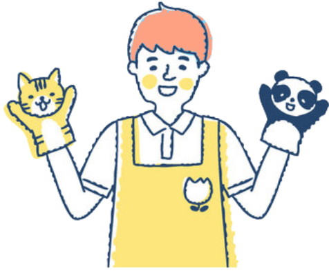 両手にハンドパペットをはめた保育士の男性イラスト。黄色いエプロンを着けたオレンジ髪の男性が、左手にネコ、右手にパンダのぬいぐるみを持ち、笑顔で子どもたちに語りかけている様子。